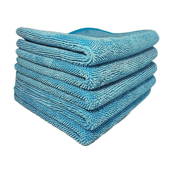 Stack of blue microfiber cloths on a white background The house of rags Diva