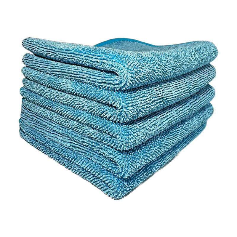 Stack of blue microfiber cloths on a white background The house of rags Diva